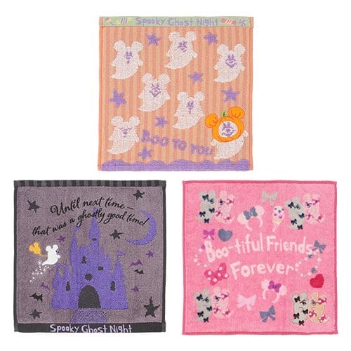 Three colorful 2025 Halloween Merchandise towels from Tokyo Disney Resort with ghosts, bats, castles, and festive text.