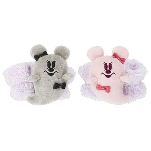 Two plush ghost toys—Tokyo Disney Resort 2025 Halloween merchandise—with bows and a fluffy purple band behind.
