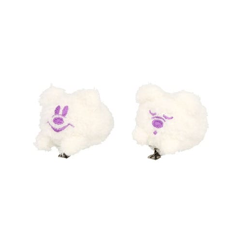 Two small, fluffy white plush clips from Tokyo Disney Resort’s 2025 Halloween Merchandise, each with a unique purple face.