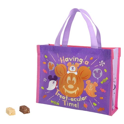 Purple Halloween tote bag from Tokyo Disney Resort features a pumpkin Mickey and candy—fun 2025 Halloween merchandise!