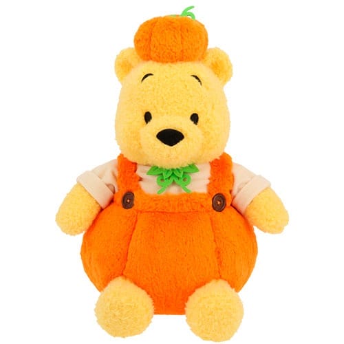 A plush bear in orange overalls and a pumpkin hat, part of Tokyo Disney Resort 2025 Halloween Merchandise.