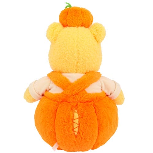 A plush bear in a pumpkin costume, part of 2025 Halloween Merchandise at Tokyo Disney Resort, shown from the back.