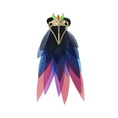A stylized bird brooch with layered blue and pink wings, inspired by Tokyo Disney Resort Halloween merchandise.