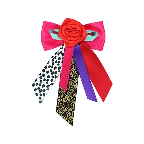 A colorful decorative bow from Tokyo Disney Resort with a red rose center, perfect for 2025 Halloween merchandise displays.