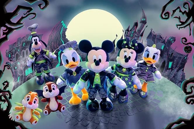 Plush Disney characters in spooky costumes showcase 2025 Halloween merchandise at Tokyo Disney Resort’s haunted castle.