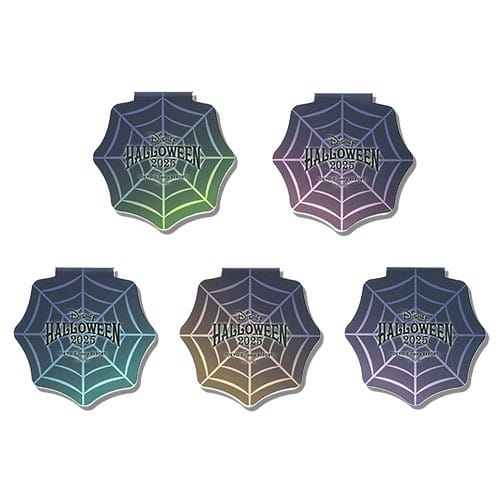 Five 2025 Halloween Merchandise pins shaped like spiderwebs in green, pink, blue, black, and purple at Tokyo Disney Resort.