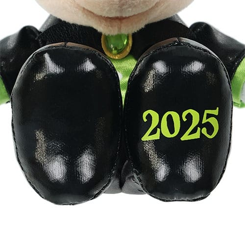 Close-up of a plush toy with shiny black gloves, featuring "2025" on the right—Tokyo Disney Resort Halloween merchandise.