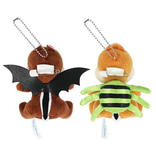Two plush animal keychains from Tokyo Disney Resort Halloween merchandise, shown from the back with bat wings and spider legs.