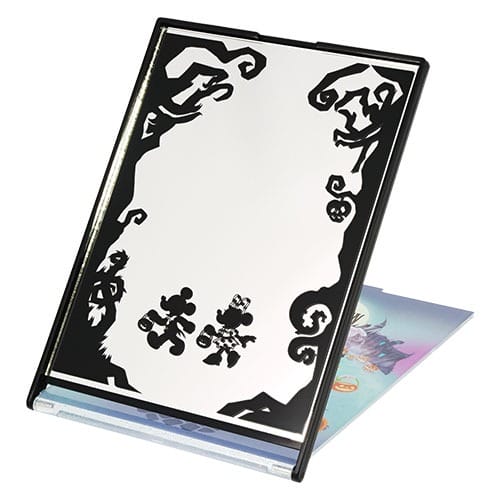 A standing mirror from Tokyo Disney Resort 2025, featuring black cartoon silhouettes and swirling Halloween designs.