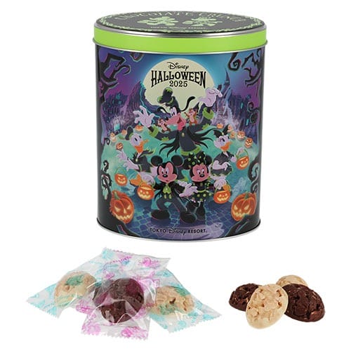 A 2025 Halloween merchandise tin from Tokyo Disney Resort with Mickey, friends, and assorted chocolate treats beside it.