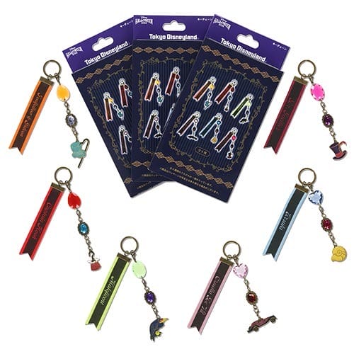 Tokyo Disney Resort 2025 Halloween Merchandise: villain-themed keychains and stickers in a circle on white background.