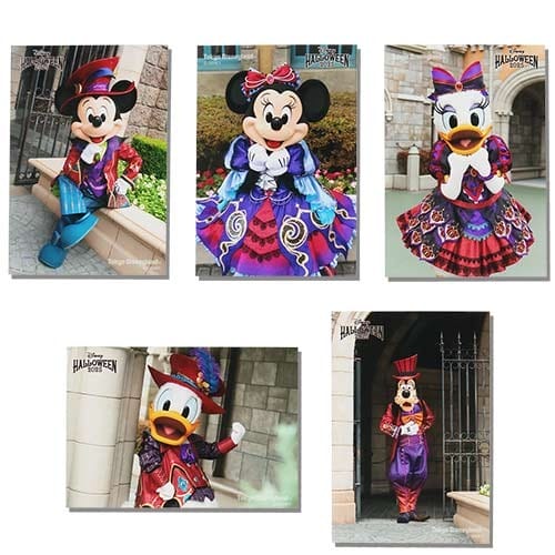 Five Disney characters in Halloween costumes pose outside, celebrating Tokyo Disney Resort Halloween merchandise.