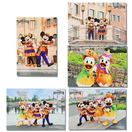 Five photos of Disney characters in Halloween costumes at Tokyo Disney Resort with 2025 Halloween merchandise on display.