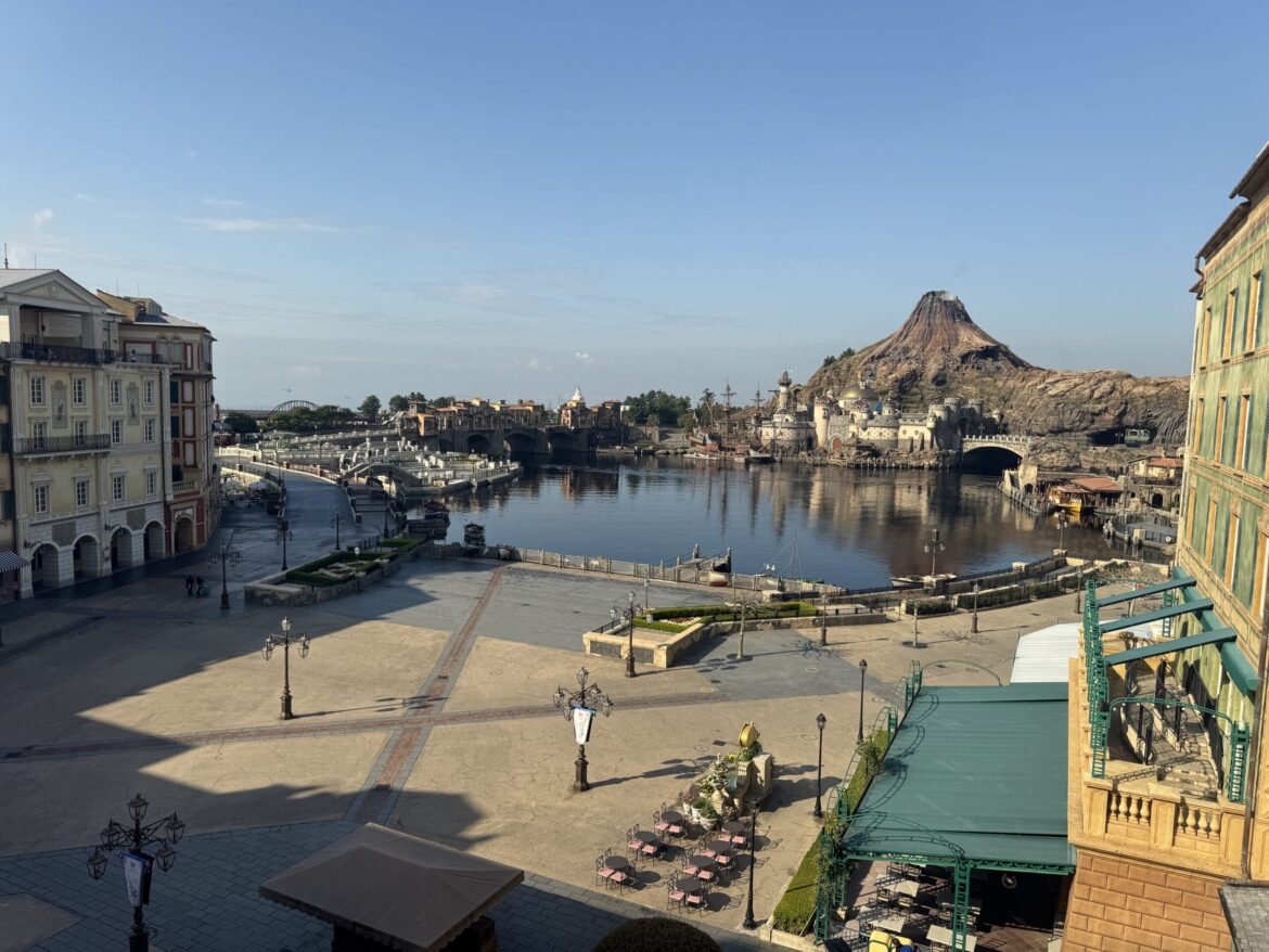 Mount Prometheus Designation Removed From Map at Tokyo DisneySea A panoramic information sign describes points of interest in a themed waterfront area with rocky and architectural features.
