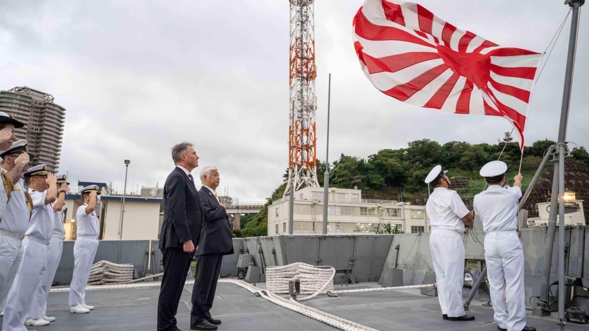 Australia's defense minister visits a frigate in Japan as the countries boost defense ties