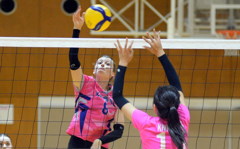 Sara Mei Fussinger spikes the ball.
