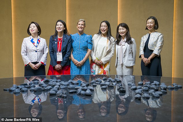 The Duchess of Edinburgh poses with participants Hanako Jimi (L), Rui Matsukawa (2nd L), Sachiko Nakajima, Naoe Yakiya and June Miyachi ahead of a panel discussion on gender equality