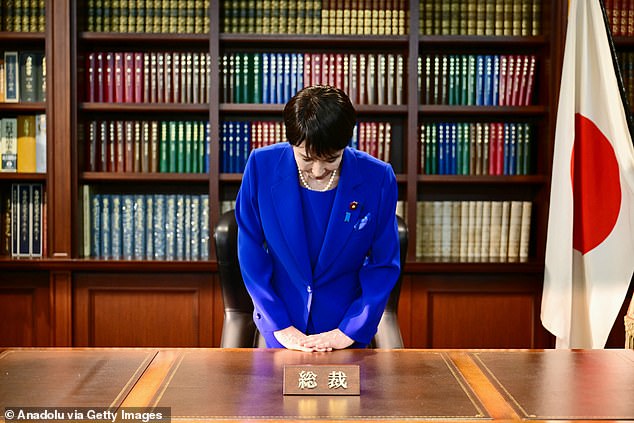 Takaichi bows as she leaves the party leader's office. She said: 'Now that the LDP has its first female president, its scenery will change a little'