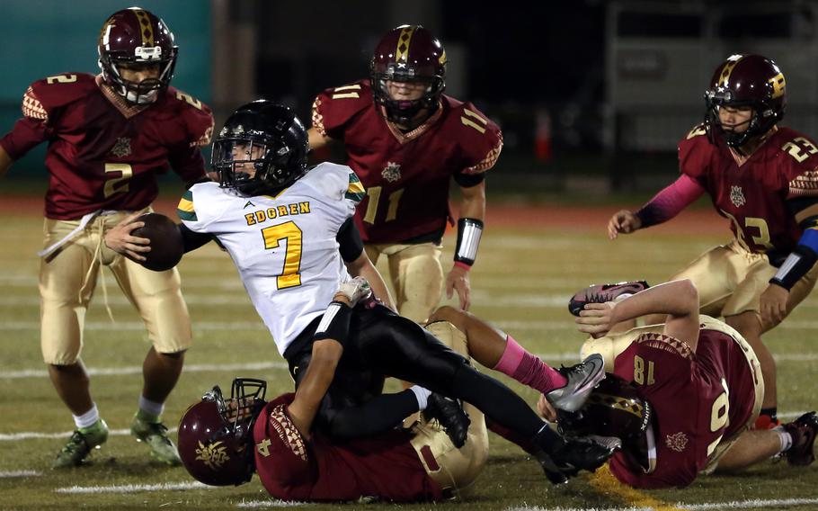 Kody Ramos tackles Haruki Jones.
