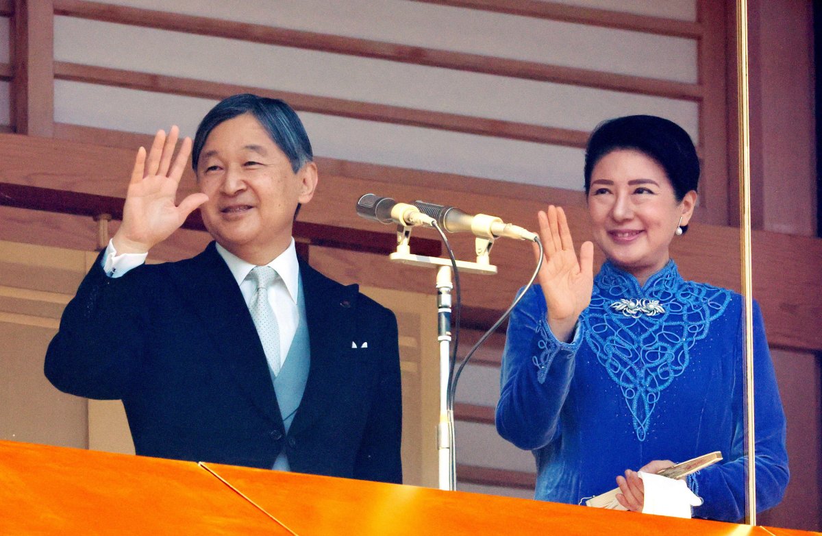 The Emperor and Empress of Japan wave from the balcony of the Imperial Palace in Tokyo during his 65th birthday celebrations on February 23, 2025 (Nippon News/Alamy)