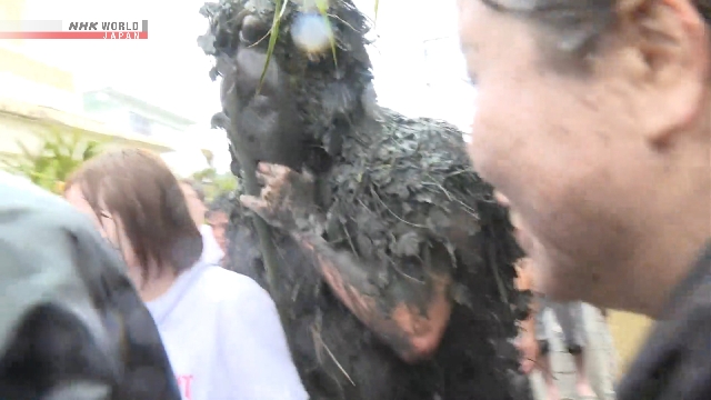 Mud-smearing festival held in Okinawa to chase out evil Mud-smearing festival held in Okinawa to chase out evil