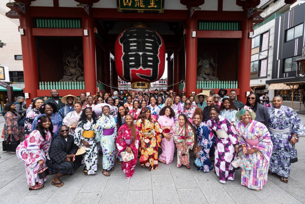 Group photo of Soca in Japan participants at Asakusa Senso-ji Buddhist Temple in Tokyo Prefecture, Japan during the annual Soca In Japan festivities in September. - RealShot MASATO