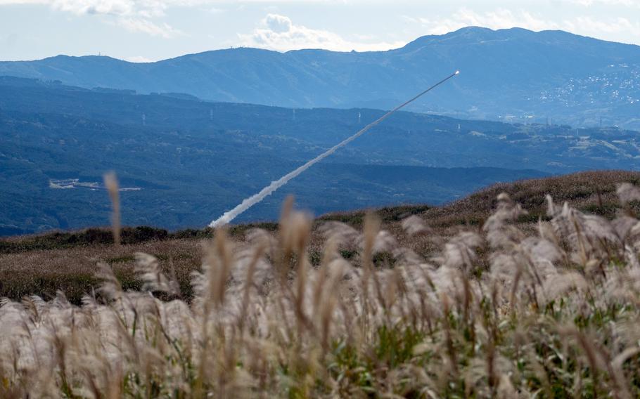 Marines launch a HIMARS rocket at a training center in Japan.