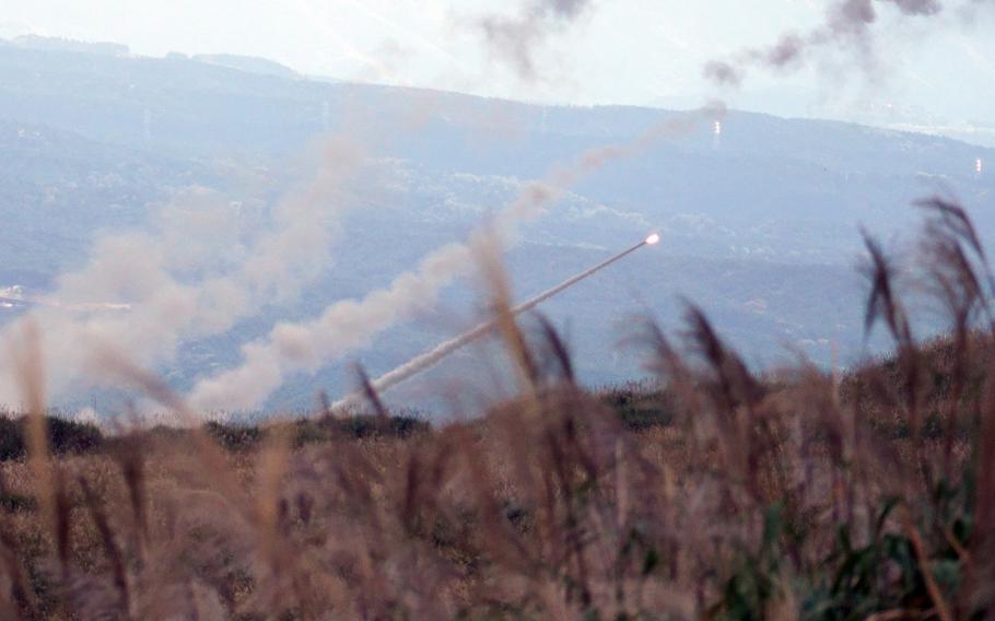 Marines launch a HIMARS rocket at a training center in Japan.