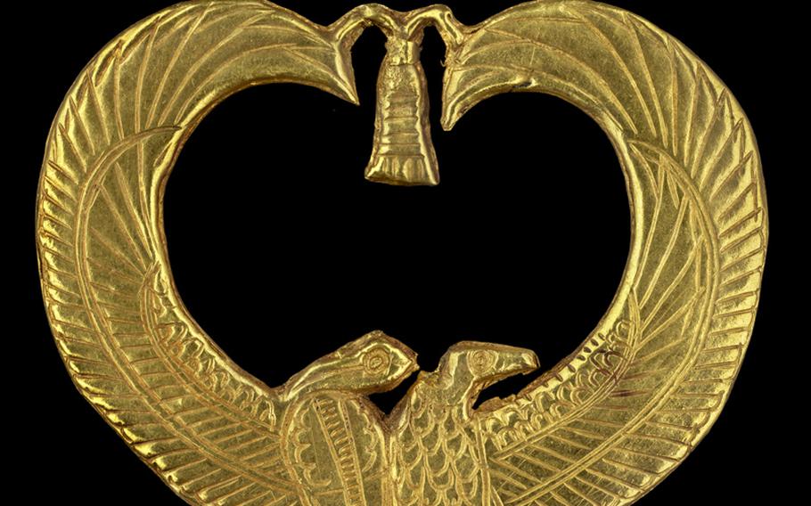 An ancient golden Egyptian amulet.