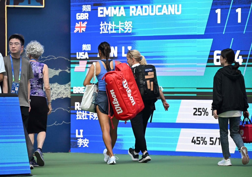 Emma Raducanu leaves the court after retiring from her match against Ann Li at the Wuhan Open. Photo: AFP