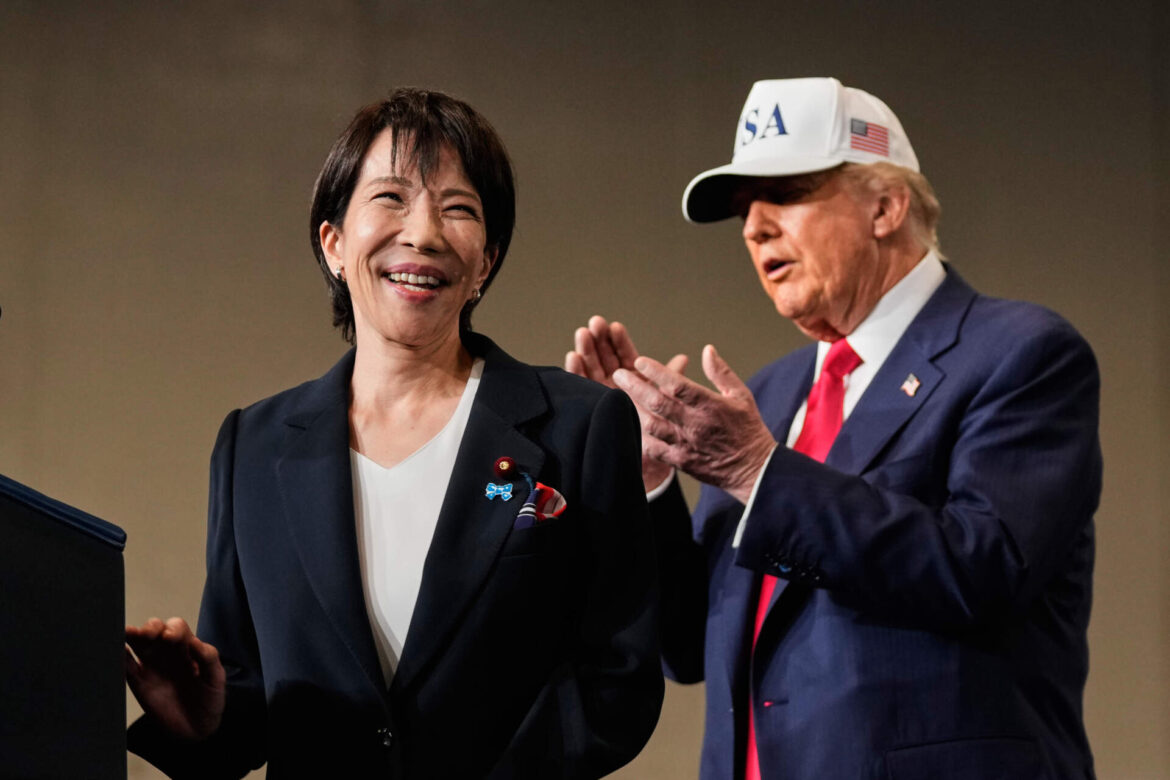 Who is Sanae Takaichi, Japan’s first female prime minister who won over Trump? Japanese Prime Minister Sanae Takaichi, with President Donald Trump, reacts as she was speaking to members of the military aboard the USS George Washington, an aircraft carrier docked at an American naval base, in Yokosuka, Tuesday, Oct. 28, 2025. (Mark Schiefelbein/AP)
