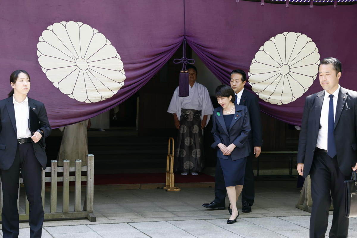 Sanae Takaichi, Japanese minister in charge of economic security, finishes offering prayers at the war-linked Yasukuni shrine in Tokyo on April 21, 2023. (Photo by Kyodo News via Getty Images)