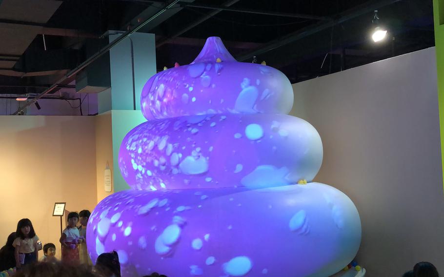 a giant unko statue