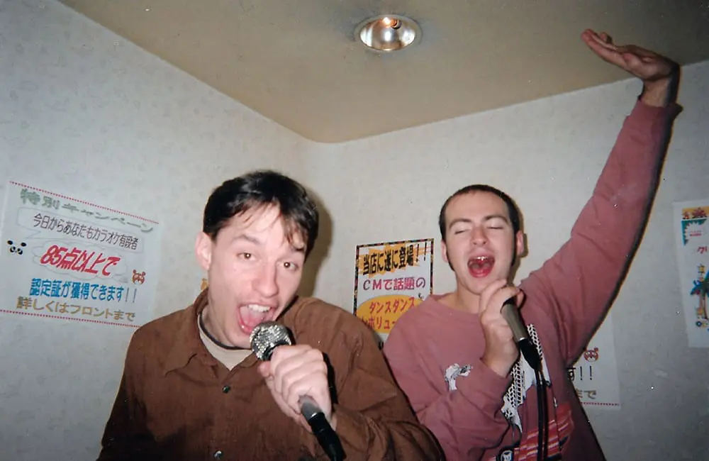 Inside Travel Group fouders Simon King & Alastair Donnelly do Christmas Karaoke in Japan.