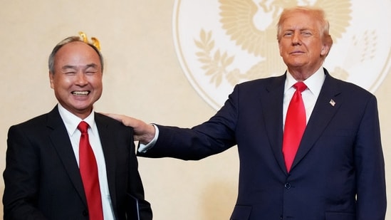 Softbank CEO Masayoshi Son and U.S. President Donald Trump react after the signing of memorandums of understanding during a meeting with business leaders at the U.S. Ambassador's Residence on October 28, 2025 in Tokyo, Japan. Trump is visiting Japan, fresh off an appearance at the ASEAN summit in Malaysia, and will next travel to South Korea for the APEC meetings. Andrew Harnik/Getty Images/AFP (Photo by Andrew Harnik / GETTY IMAGES NORTH AMERICA / Getty Images via AFP)(Getty Images via AFP)