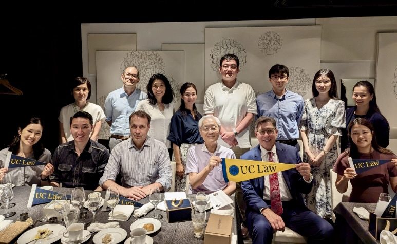 A group photo of Japan-based alumni with Professor Setsuo Miyazawa, Dean of Enrollment June Sakamoto, and Chancellor & Dean David Faigman 