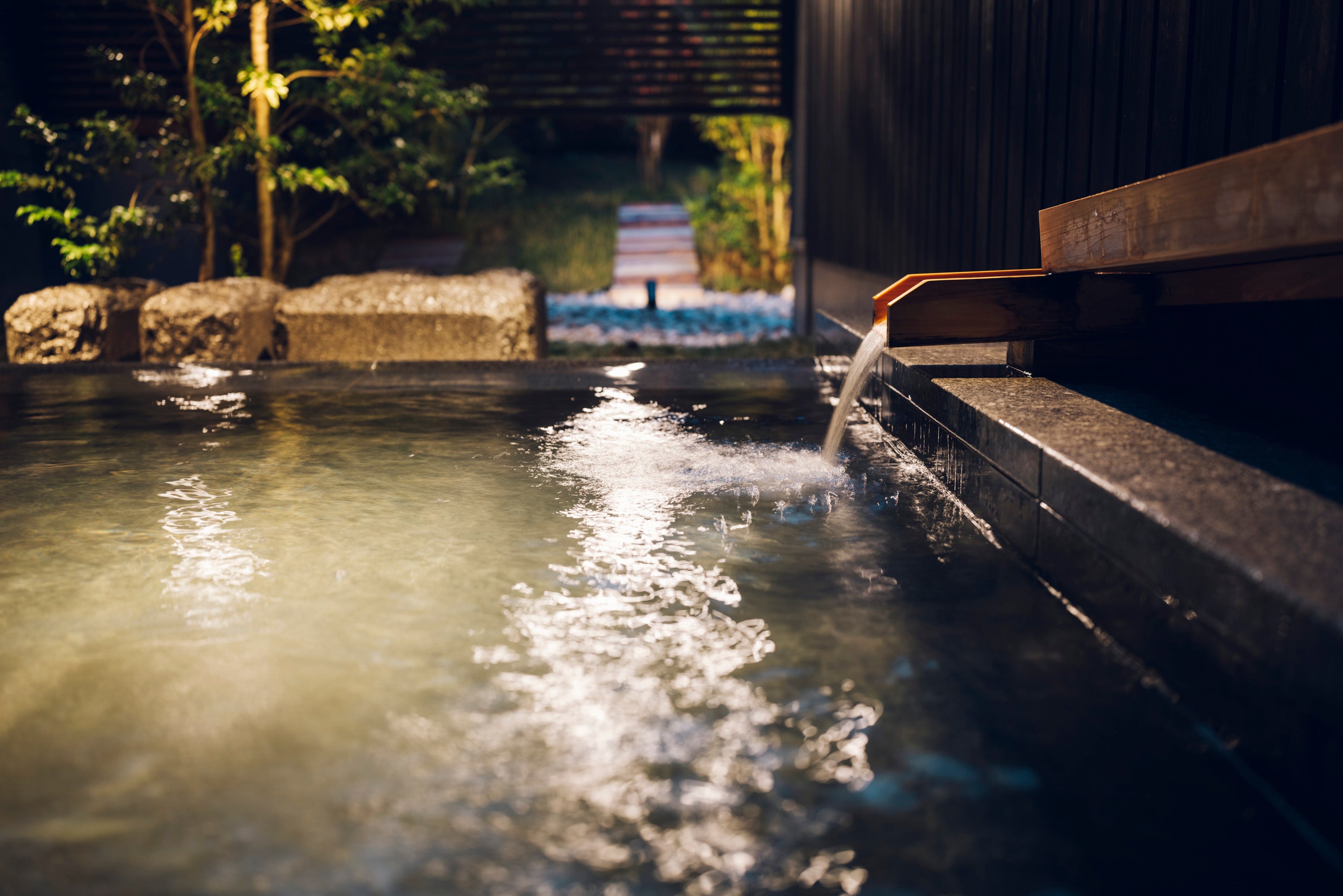 The hotel is near the public hot spring that attracts visitors to the spa town