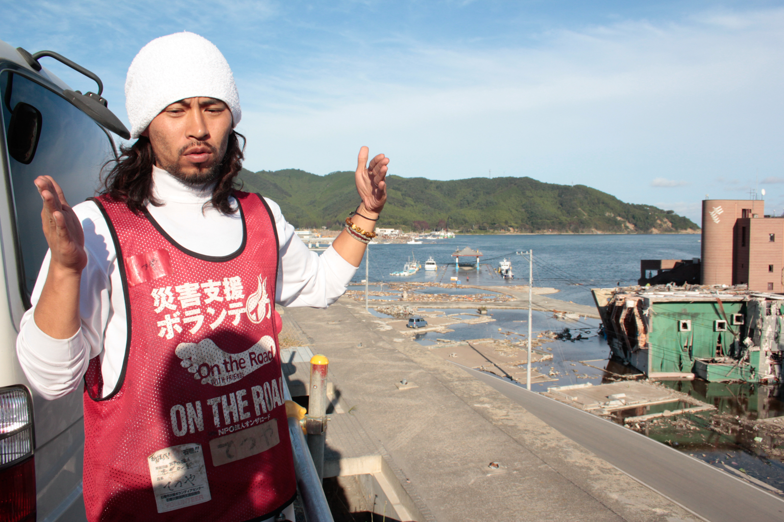 Volunteer prepares to help with the cleanup after the tsunami in Tohoku