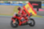 Marc with the Spanish flag after the race ended in Motegi | Credit: Michelin_Sport via X