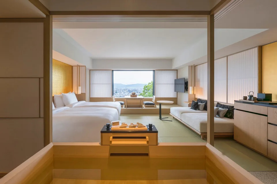 A deep wooden soaking tub can be found in the rooms at Bayan Tree (Banyan Tree)
