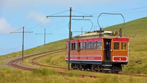 Alamy Opened in 1895, the Snaefell Mountain Railway carries tourists to the Isle of Man's highest point for panoramic view (Credit: Alamy)