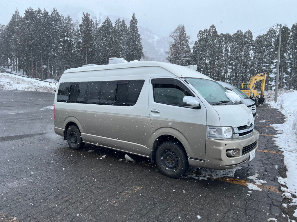 arked in the spacious RV parking spaces at Hakuba Goryu ski resort.