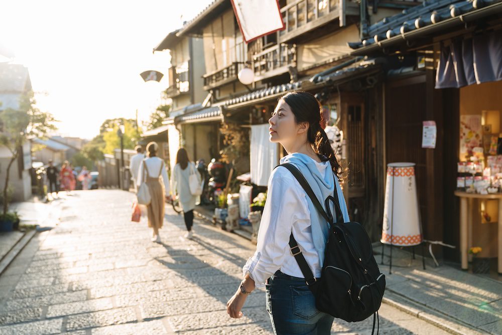 A traveller in Kyoto. Intrepid Travel alt