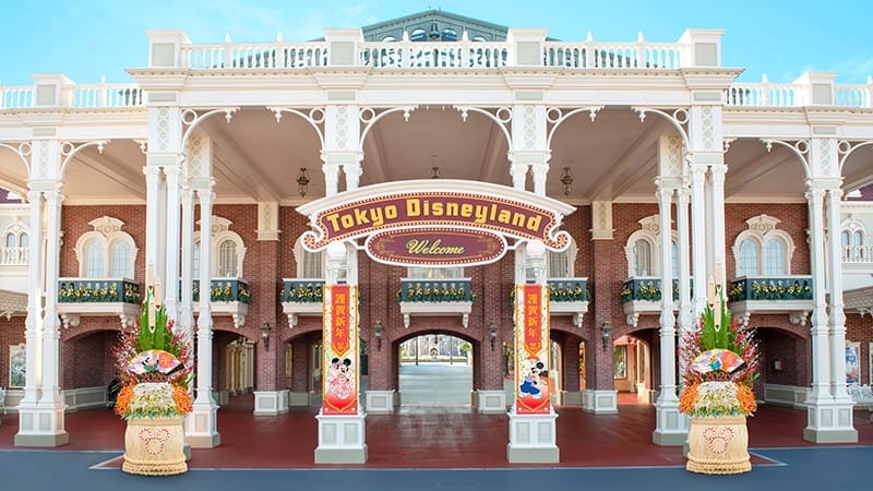 Festive 2026 New Year’s display at Tokyo Disneyland’s entrance, with Cinderella Castle unique from other Disney Parks castles.