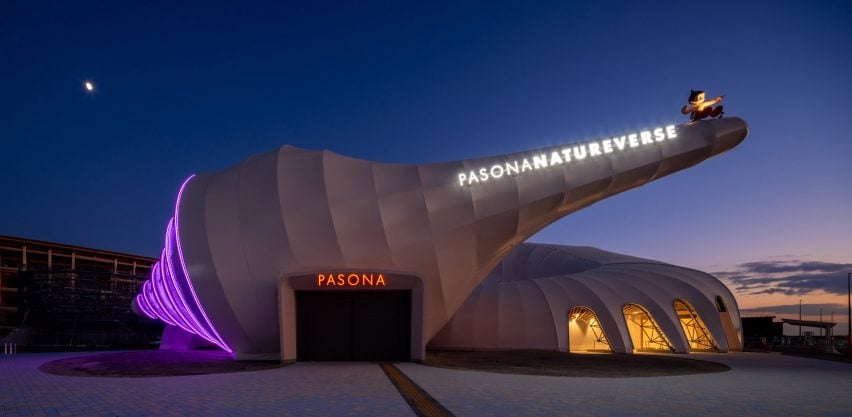 Exterior view of the Pasona Natureverse Pavilion at night