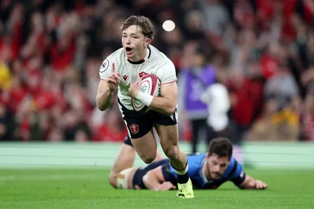 Dan Edwards of Wales scores his team's first try