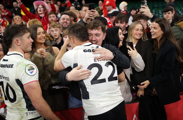 Jarrod Evans of Wales with family at full time
