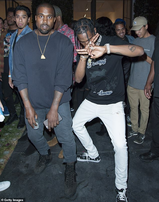 'S***, man. That's my kid's uncle,' Scott said of West at the time. 'That guy took me in when I was young, when I was like 19'; the pair seen in 2016 in Hollywood