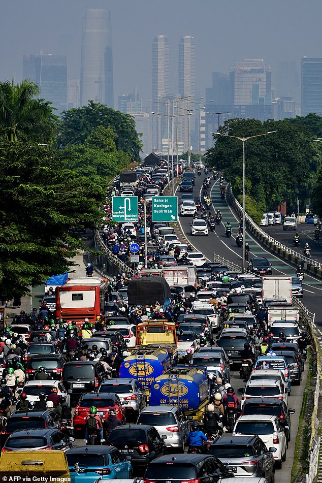 A traffic jam on a main road leading into the city centre of Jakarta on May 8, 2024