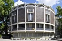 The round library section designed by Togo Murano is seen on Kansai University's Senriyama Campus in Suita, Osaka Prefecture, Sept. 1, 2025. The exterior walls are covered with dark brown salt-fired tiles. (Mainichi/Tsutomu Koseki)